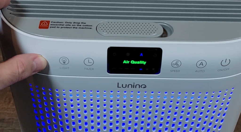 Modern white Lunino air purifier with blue LED ambient lighting for home and office use